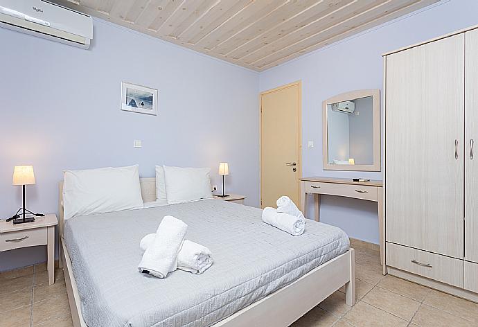 Double bedroom with A/C . - Nafsika Beach House . (Photo Gallery) }}