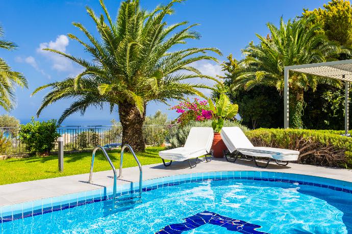 Private pool, terrace, and garden with sea views . - Villa Sevos . (Fotogalerie) }}