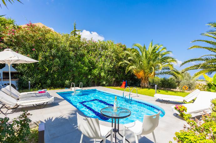 Private pool, terrace, and garden with sea views . - Villa Sevos . (Photo Gallery) }}