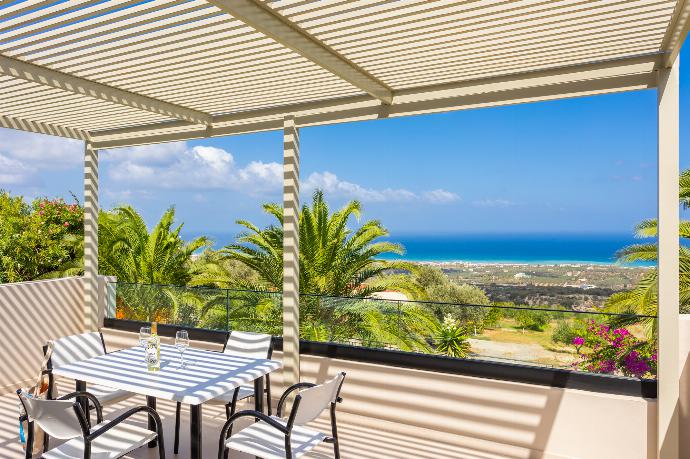 Upper terrace area with sea views . - Villa Sevos . (Galería de imágenes) }}