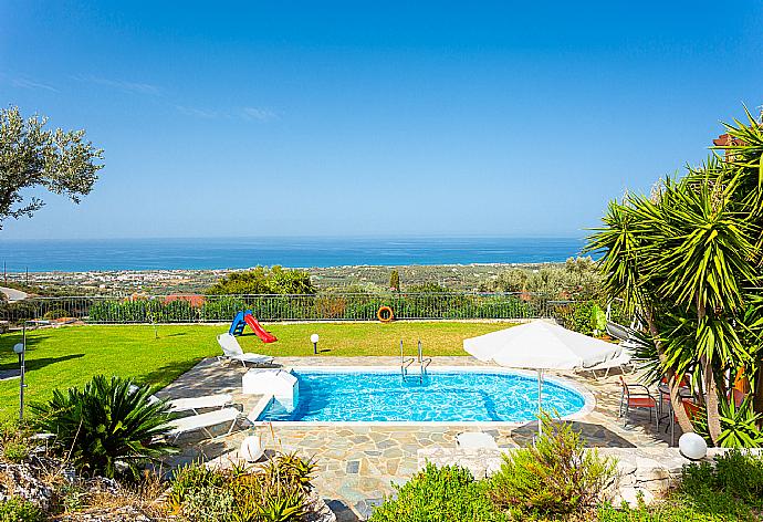 Private pool, terrace, and garden with panoramic sea views . - Villa Garifallia . (Galería de imágenes) }}