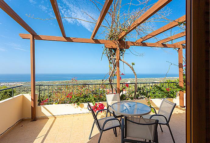 Upper terrace area with panoramic sea views . - Villa Garifallia . (Photo Gallery) }}