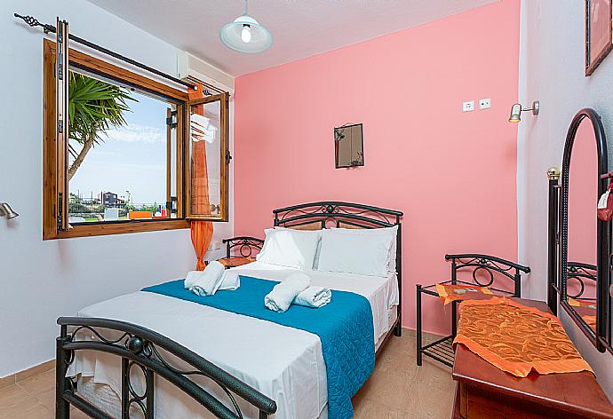 Double bedroom with A/C  . - Villa Garifallia . (Photo Gallery) }}