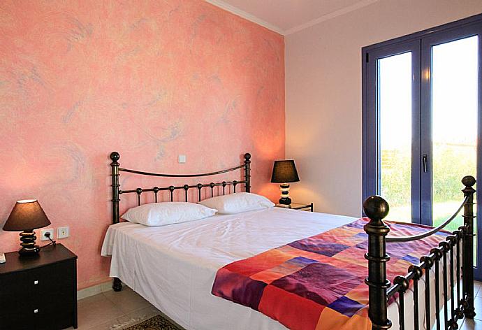 Double bedroom with A/C . - Villa Nisyros . (Photo Gallery) }}