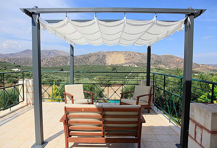 Sheltered upper terrace with views . - Villa Dimitris . (Photo Gallery) }}