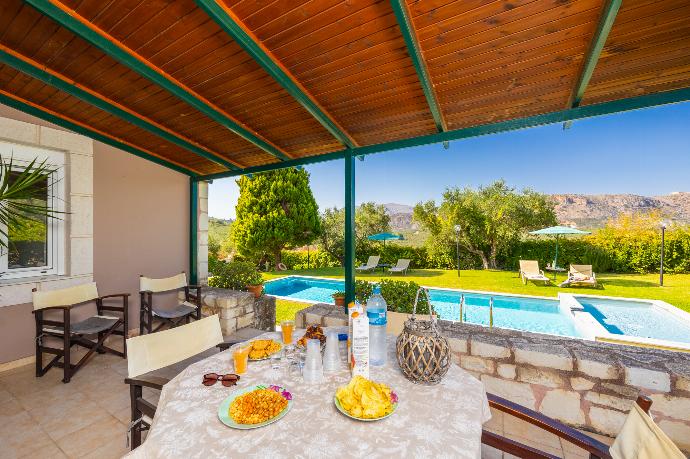 Sheltered terrace area . - Villa Dimitris . (Photo Gallery) }}