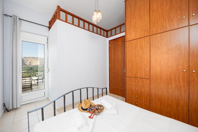 Double bedroom with A/C . - Villa Dimitris . (Photo Gallery) }}