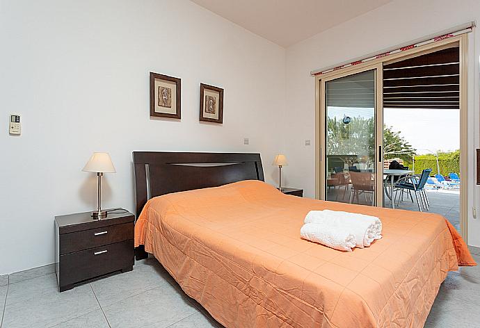 Double bedroom with A/C and terrace access . - Villa Prodromos . (Photo Gallery) }}