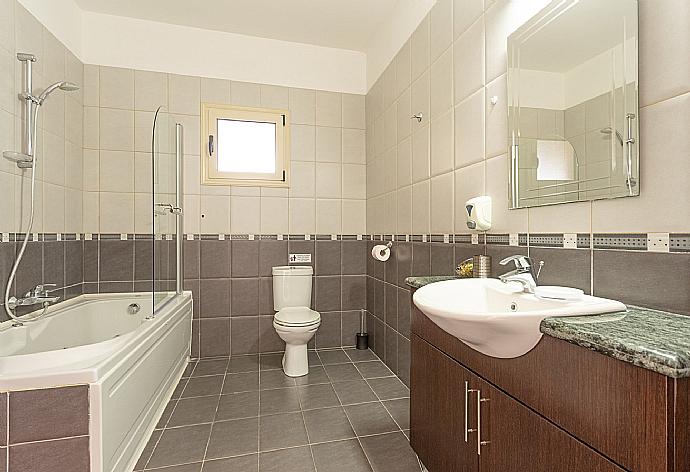 Family bathroom with bath and shower . - Villa Prodromos . (Photo Gallery) }}