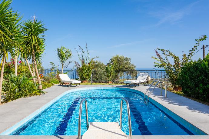 Private pool, terrace, and garden with sea views . - Villa Michalis . (Photo Gallery) }}
