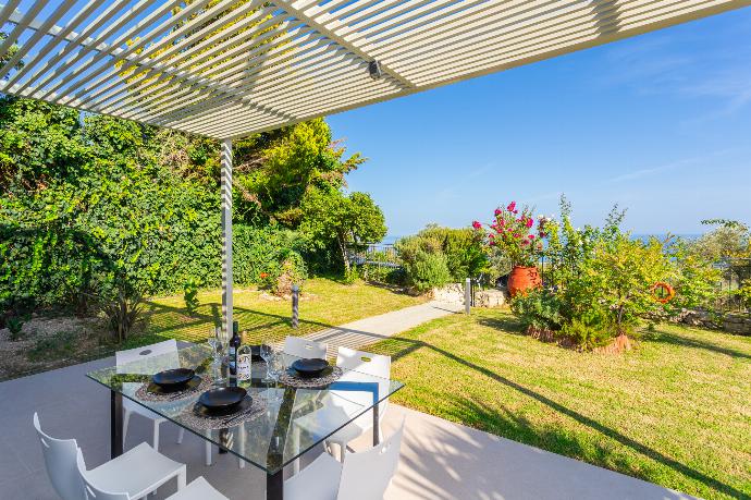 Terrace area with sea views . - Villa Michalis . (Photo Gallery) }}