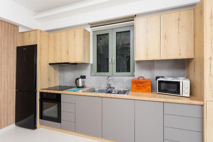 Equipped kitchen . - Villa Michalis . (Fotogalerie) }}