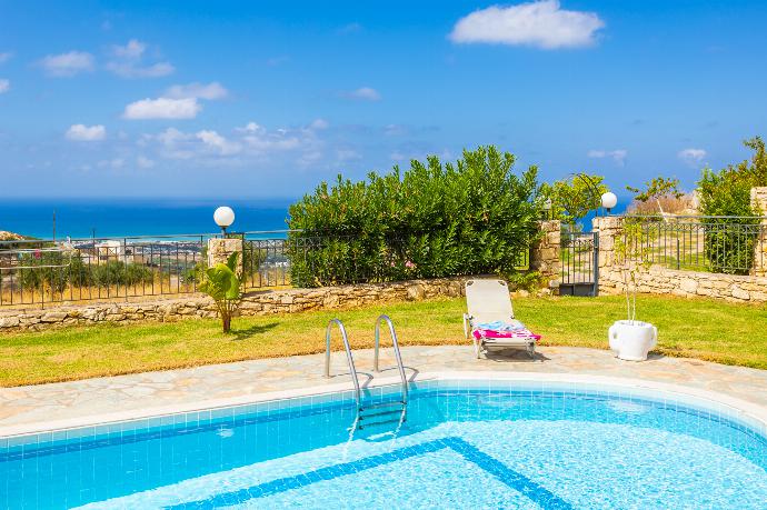 Private pool, terrace, and garden with sea views . - Villa Spiridoula . (Photo Gallery) }}