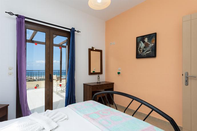Double bedroom with A/C and sea views . - Villa Spiridoula . (Photo Gallery) }}