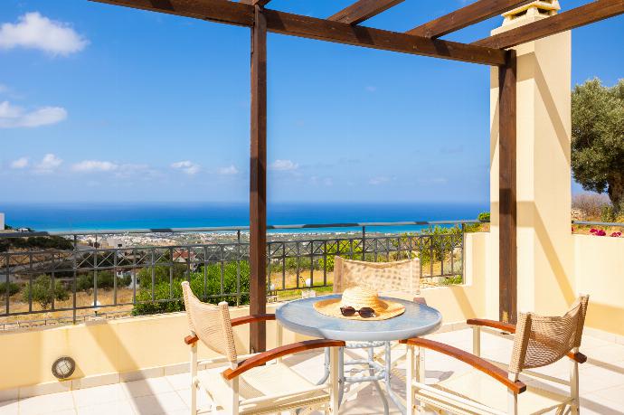 Upper terrace area with sea views . - Villa Spiridoula . (Photo Gallery) }}