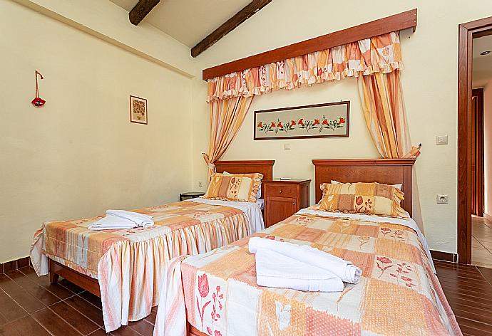 Twin bedroom with A/C and pool terrace access . - Villa Dimitrios . (Photo Gallery) }}