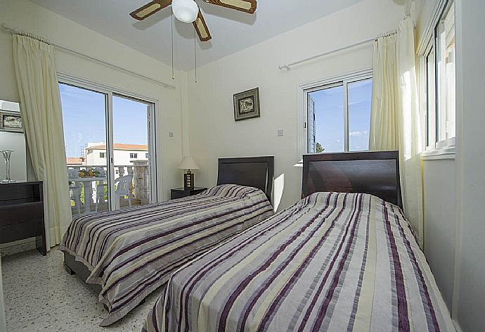 Twin bedroom with A/C and balcony access . - Villa Prodromi . (Photo Gallery) }}