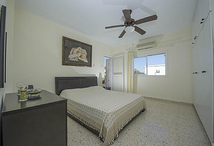 Double bedroom with A/C and balcony access . - Villa Prodromi . (Photo Gallery) }}