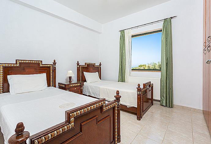 Twin bedroom with A/C . - Villa Olivetta . (Photo Gallery) }}