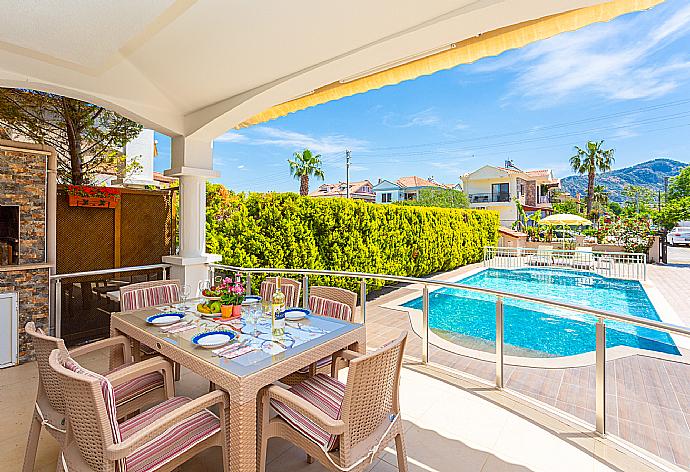 Sheltered terrace area with BBQ . - Villa Canberk . (Fotogalerie) }}