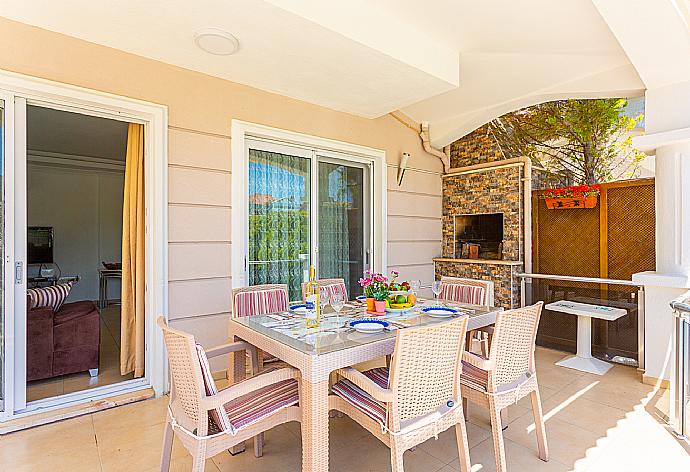 Sheltered terrace area with BBQ . - Villa Canberk . (Fotogalerie) }}