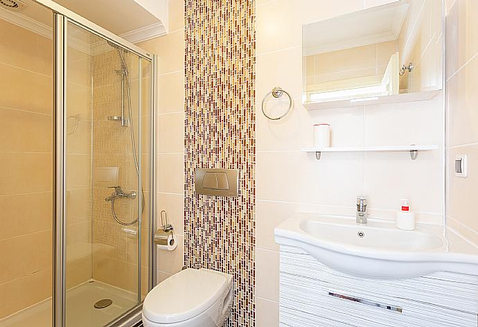 En suite bathroom with shower . - Villa Canberk . (Photo Gallery) }}