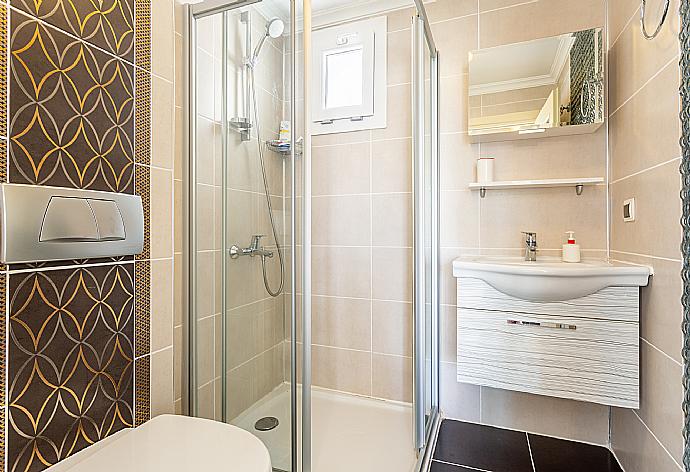 En suite bathroom with shower . - Villa Canberk . (Photo Gallery) }}