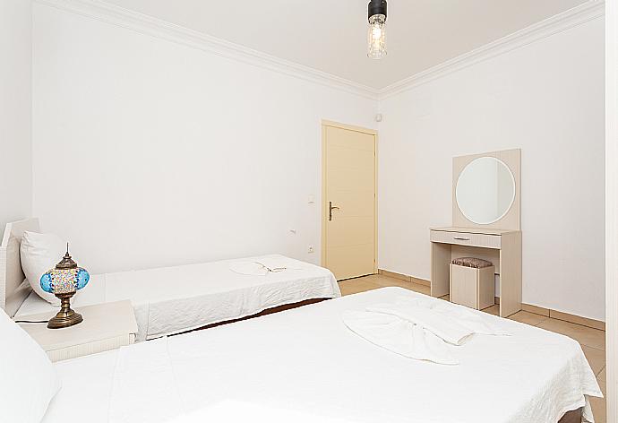 Twin bedroom with A/C . - Villa Canberk . (Галерея фотографий) }}