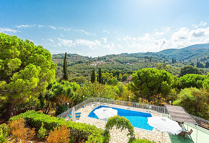 View of shared pool from upper terrace area . - Cochelli Villa Upper . (Photo Gallery) }}