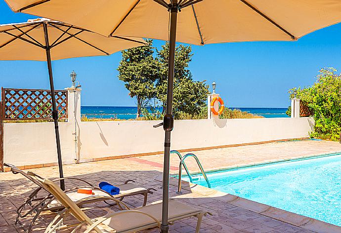 Private pool and terrace with sea views . - Achilles Beach Villa . (Галерея фотографий) }}