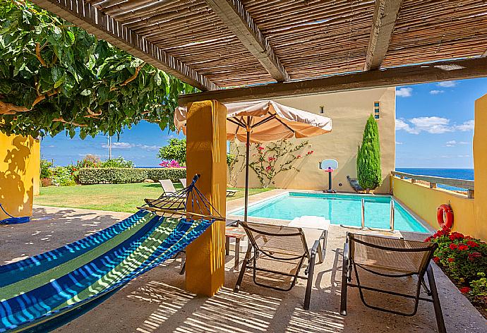 Private pool and terrace area with sea views . - Villa Liakada . (Galleria fotografica) }}