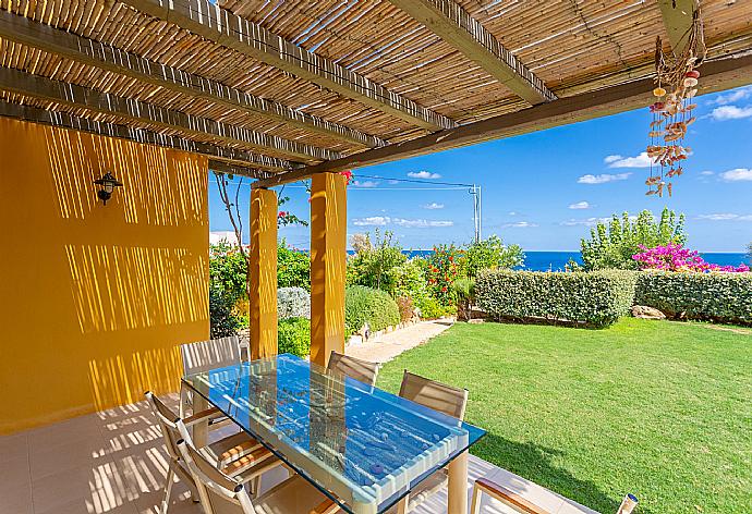 Terrace area with sea views . - Villa Liakada . (Photo Gallery) }}