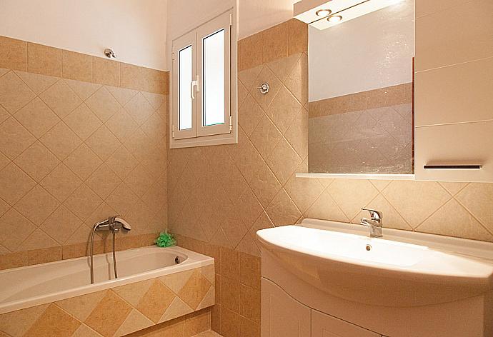 Bathroom with bath . - Villa Christina . (Photo Gallery) }}