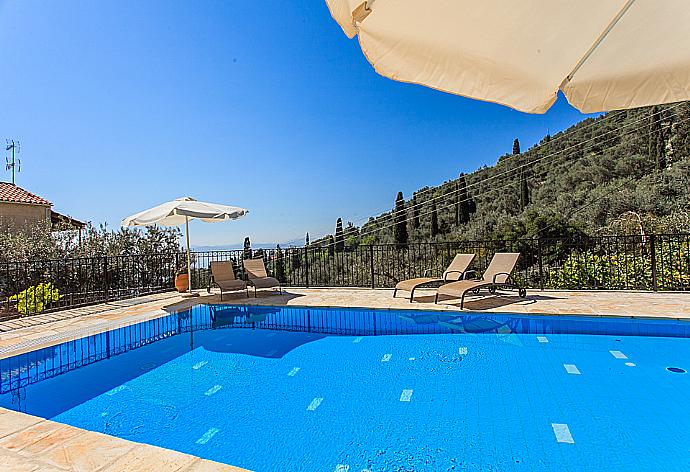 Private pool with terrace area . - Villa Christina . (Photo Gallery) }}