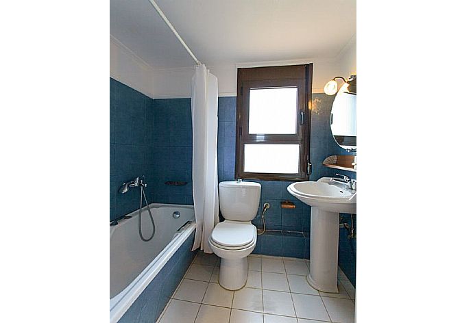 Family bathroom with bath and shower . - Ekklisies Tria . (Photo Gallery) }}