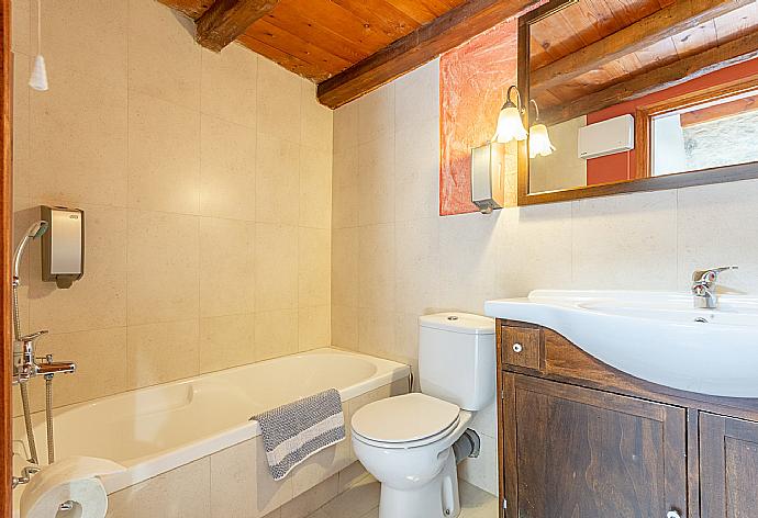 Bathroom with bath and shower . - Archontiko Galliaki . (Photo Gallery) }}