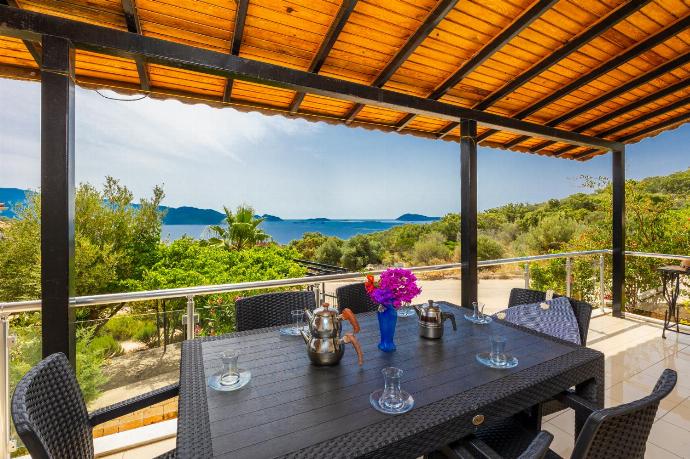 Sheltered terrace area with sea views . - Villa Erdem . (Photo Gallery) }}