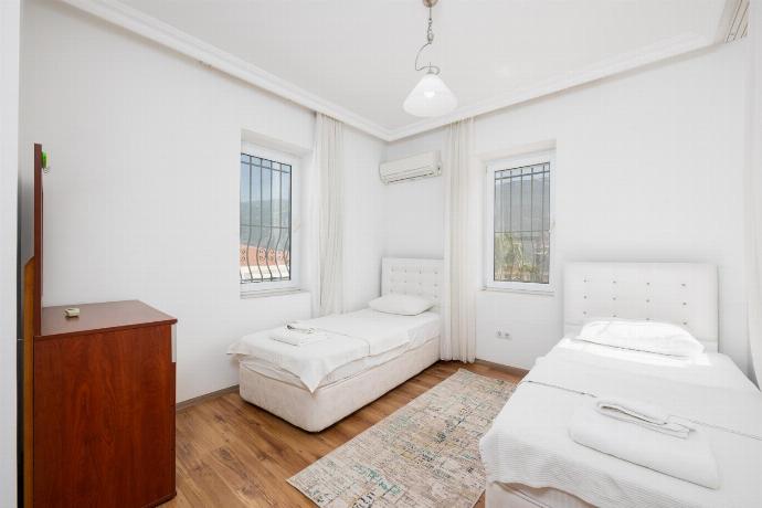Twin bedroom with A/C . - Villa Erdem . (Photo Gallery) }}