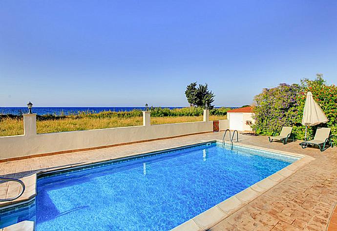 Private pool and terrace with sea views . - Achilles Beach Villa Thio . (Photo Gallery) }}