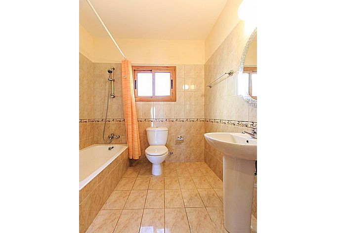 Bathroom with bath and shower . - Achilles Beach Villa Thio . (Photo Gallery) }}