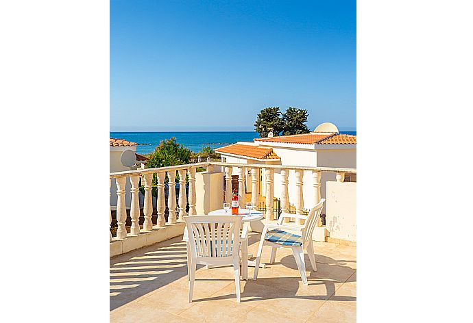 Upper terrace area with sea views . - Hector Beach Villa . (Galería de imágenes) }}