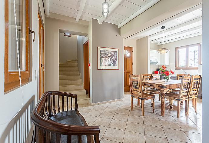 Open-plan living room with sofas, dining area, kitchen, WiFi internet, satellite TV, DVD player, and terrace access . - Villa Neria . (Fotogalerie) }}