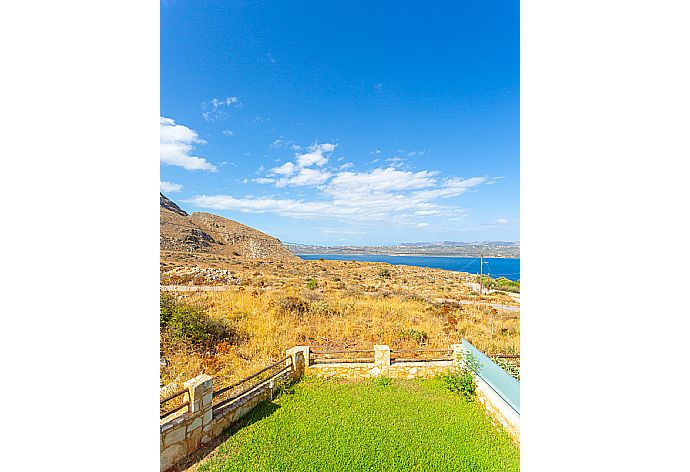 View of garden area from bedroom window . - Villa Stratos . (Photo Gallery) }}