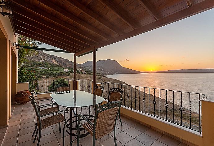 Sunset from balcony . - Souda Bay View . (Photo Gallery) }}