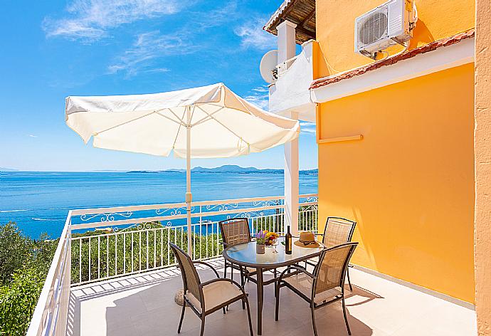 Upper terrace area with panoramic sea views . - Villa Amalia . (Photo Gallery) }}