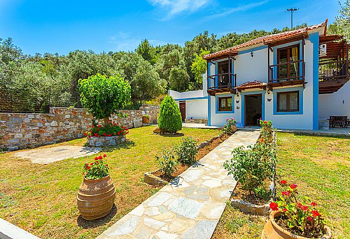 Sheltered terrace area with BBQ . - Villa Glysteri . (Photo Gallery) }}