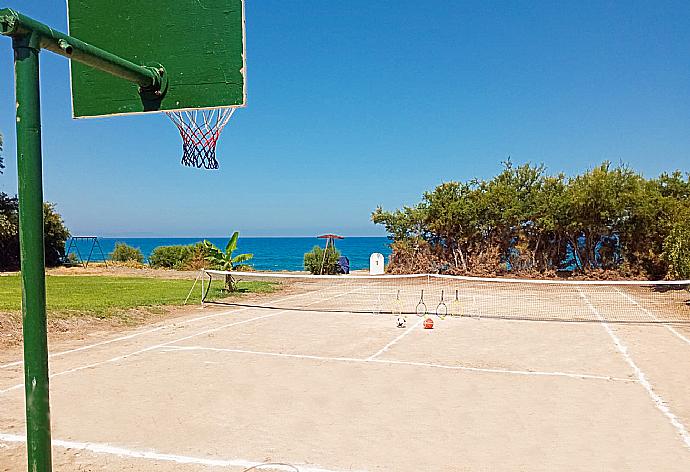 Tennis/basketball court . - Kalisto Beach Villa . (Галерея фотографий) }}