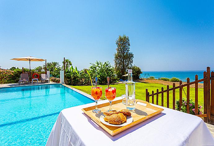 Private infinity pool, terrace, and garden with panoramic sea views . - Kalisto Beach Villa . (Photo Gallery) }}