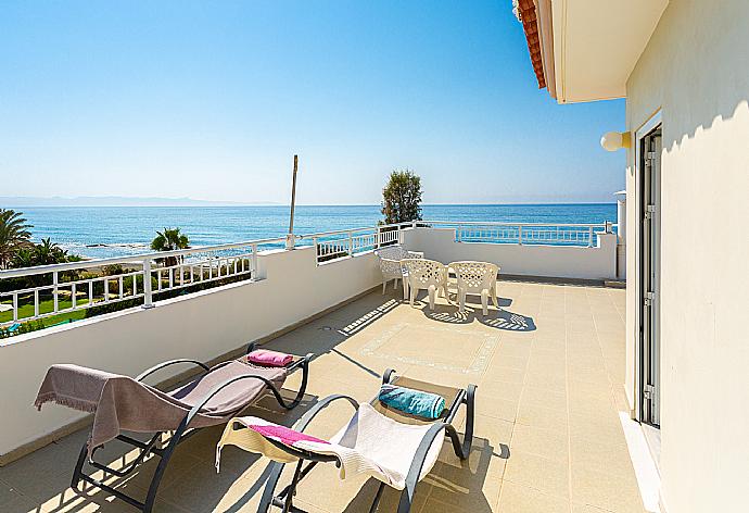 Upper terrace with panoramic sea views . - Kalisto Beach Villa . (Photo Gallery) }}