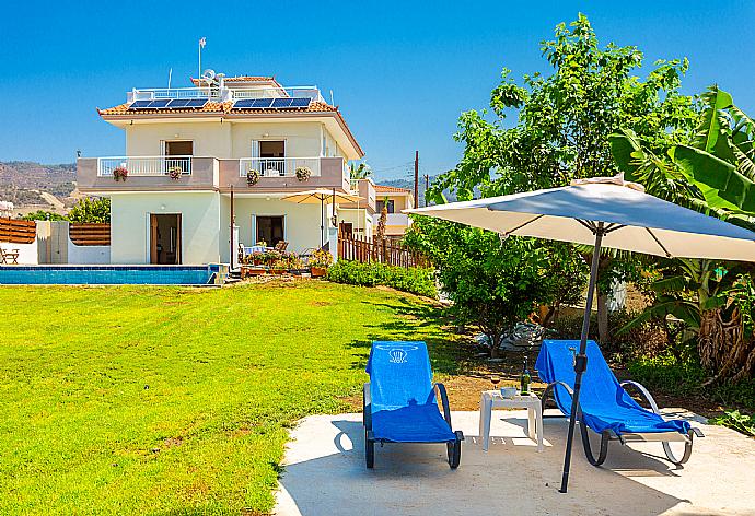 Garden area . - Kalisto Beach Villa . (Galerie de photos) }}